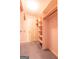 Walk-in closet with ample storage space, shelving, and hanging rods for organized clothing at 115 Flagstop Run, Fayetteville, GA 30215