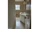 White vanity in bathroom with sink and mirror at 191 Charles Cox Dr, Canton, GA 30115