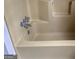 Beige bathtub with faucet and drain at 191 Charles Cox Dr, Canton, GA 30115