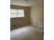 Bedroom with a window letting in natural light at 191 Charles Cox Dr, Canton, GA 30115