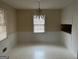Dining room with chandelier and window at 191 Charles Cox Dr, Canton, GA 30115