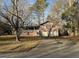 Split level home featuring an attached two car garage and covered front porch at 191 Charles Cox Dr, Canton, GA 30115