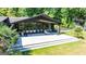 Spacious back patio with seating overlooks the backyard at 129 Old Norton Rd, Fayetteville, GA 30215