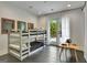 Charming bedroom featuring bunk beds, a small table, and French doors that open to the outside at 129 Old Norton Rd, Fayetteville, GA 30215