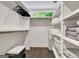 Organized walk-in closet with shelves, hanging racks, and ample storage space at 129 Old Norton Rd, Fayetteville, GA 30215