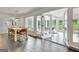 Bright dining room with hardwood floors and patio access at 129 Old Norton Rd, Fayetteville, GA 30215