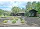 An exterior view of the home with lush landscaping and an inviting curb appeal at 129 Old Norton Rd, Fayetteville, GA 30215