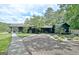 Beautiful landscaped exterior view of the home at 129 Old Norton Rd, Fayetteville, GA 30215