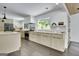 Modern kitchen featuring stainless steel appliances, sleek cabinetry, and a large window offering natural light at 129 Old Norton Rd, Fayetteville, GA 30215