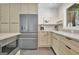 Close-up of kitchen featuring stainless steel refrigerator and modern appliances at 129 Old Norton Rd, Fayetteville, GA 30215