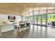 Bright living room with hardwood floors, recessed lighting, and expansive lake views at 129 Old Norton Rd, Fayetteville, GA 30215