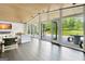 A bright living room extends to an outdoor patio with stunning lake views at 129 Old Norton Rd, Fayetteville, GA 30215