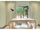 Home office featuring a desk and a door leading to an outdoor area at 129 Old Norton Rd, Fayetteville, GA 30215