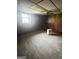 Simple basement room with paneling and window; ready for customization at 2574 Rosedale Dr, Morrow, GA 30260