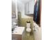 Bathroom featuring a sink vanity, toilet, and medicine cabinet, creating a cozy space at 2574 Rosedale Dr, Morrow, GA 30260