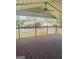 Outdoor deck with ceiling fan and neighborhood views, perfect for relaxation at 2574 Rosedale Dr, Morrow, GA 30260