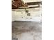 Spacious garage with pegboard walls and ample space for vehicles and storage at 2574 Rosedale Dr, Morrow, GA 30260