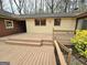 Large back deck overlooks the yard and wooded area at 2996 Jodeco Dr, Jonesboro, GA 30236