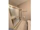 Bathroom with sliding glass doors for the bath tub, light tile, and toilet at 2996 Jodeco Dr, Jonesboro, GA 30236