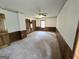 Bedroom featuring wainscoting, patterned wallpaper and a ceiling fan at 2996 Jodeco Dr, Jonesboro, GA 30236