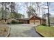 Charming home with stone accents, two-car garage, and a large driveway at 2996 Jodeco Dr, Jonesboro, GA 30236
