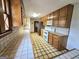 Functional kitchen featuring tiled floors and countertops with plenty of storage at 2996 Jodeco Dr, Jonesboro, GA 30236