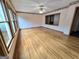 Living room features hardwood floors, plenty of natural light, and access to other rooms at 2996 Jodeco Dr, Jonesboro, GA 30236