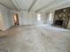 Large living room with stone fireplace and access to other rooms in the house at 2996 Jodeco Dr, Jonesboro, GA 30236