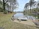 A picturesque view of the tranquil lake with boats docked nearby at 2996 Jodeco Dr, Jonesboro, GA 30236