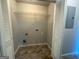 The utility closet offers wire shelving and neutral walls at 710 Bluebird Se Dr, Conyers, GA 30094