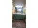 Spacious bathroom featuring dual sink vanity with a large mirror and tasteful fixtures at 9487 Lakeview Rd, Union City, GA 30291