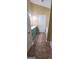 Bathroom features blue vanity, tub, and updated floors at 9487 Lakeview Rd, Union City, GA 30291