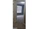 Cozy bedroom featuring neutral walls, new gray carpeting, and a sunlit window at 9487 Lakeview Rd, Union City, GA 30291