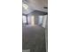 Large bedroom featuring neutral walls, new carpeting, and an entry to the closet at 9487 Lakeview Rd, Union City, GA 30291