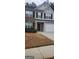 Charming two-story home with a well-maintained front yard and inviting curb appeal at 9487 Lakeview Rd, Union City, GA 30291