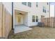 Exterior view of a backyard, featuring a covered patio and a well-maintained lawn at 77 Werner Brook Way Sw, Atlanta, GA 30354