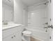 Bathroom featuring a white shower-tub and vanity with a white countertop at 77 Werner Brook Way Sw, Atlanta, GA 30354