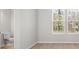 Ensuite bathroom with wood-look floors and natural light at 77 Werner Brook Way Sw, Atlanta, GA 30354