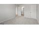Bedroom with carpet and access to an ensuite bathroom with a white door at 77 Werner Brook Way Sw, Atlanta, GA 30354