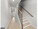 Hallway with luxury vinyl floors and stairway to upper level at 77 Werner Brook Way Sw, Atlanta, GA 30354