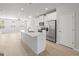 Modern kitchen with stainless steel appliances, white cabinets, and a large island at 77 Werner Brook Way Sw, Atlanta, GA 30354