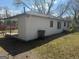 Backyard view of the back side of the house with a back porch at 6006 Blackhawk Se Trl, Mableton, GA 30126
