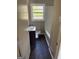 Bathroom features a shower-tub combo, a single sink vanity, and a window at 6006 Blackhawk Se Trl, Mableton, GA 30126