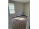 Bedroom with wall-to-wall carpeting and a window at 6006 Blackhawk Se Trl, Mableton, GA 30126