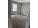 Bedroom with wall-to-wall carpeting and a window at 6006 Blackhawk Se Trl, Mableton, GA 30126