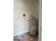 Water heater in a small storage room at 6006 Blackhawk Se Trl, Mableton, GA 30126