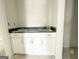 Bathroom vanity featuring a grey countertop, white cabinetry, and sleek hardware at 138 Silvercrest Dr # 169, Acworth, GA 30101