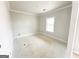 Well-lit bedroom with a large window and clean, modern trim at 138 Silvercrest Dr # 169, Acworth, GA 30101