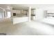 Open-concept kitchen featuring a large island, white cabinets, and modern fixtures at 138 Silvercrest Dr # 169, Acworth, GA 30101