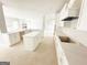 A bright kitchen space with an island and sleek white cabinets at 138 Silvercrest Dr # 169, Acworth, GA 30101
